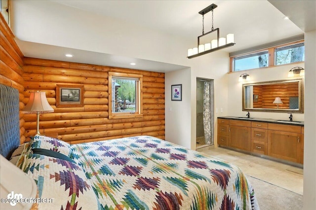 bedroom featuring a sink, recessed lighting, a towering ceiling, and rustic walls