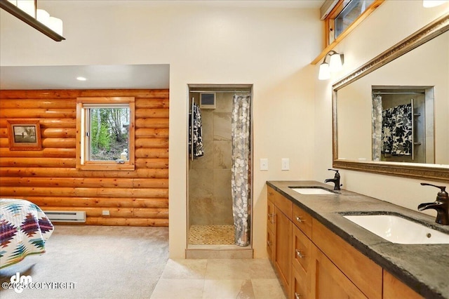 bathroom with log walls, a baseboard heating unit, a shower stall, recessed lighting, and double vanity