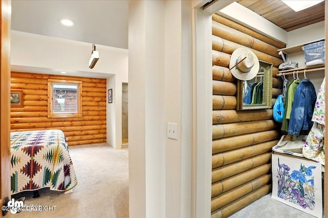 spacious closet with carpet flooring