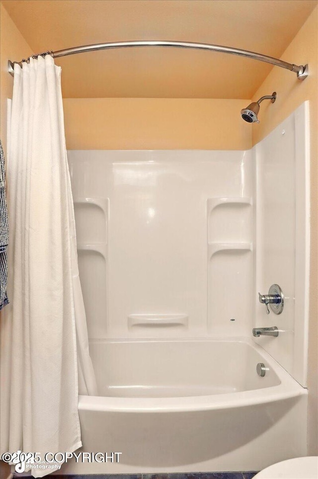 bathroom featuring shower / bath combo