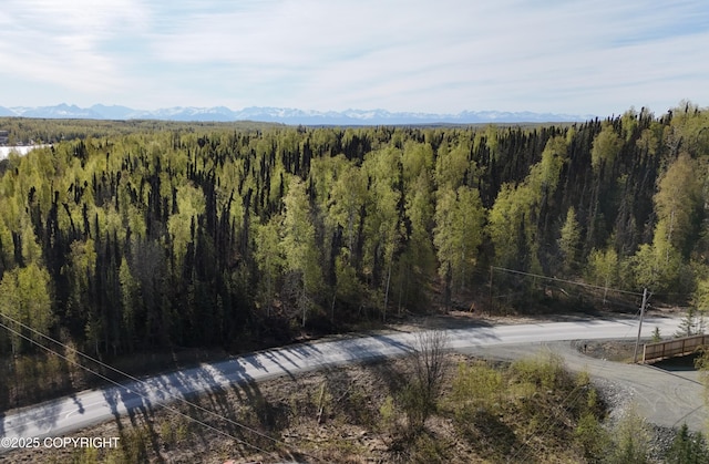 mountain view featuring a forest