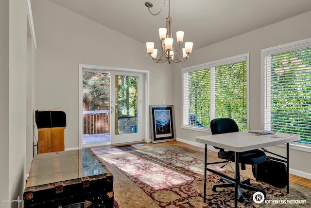 19426 Pribilof Loop, Eagle River, AK 99577 - office with healthy amount of natural light, a chandelier, wood finished floors, and lofted ceiling