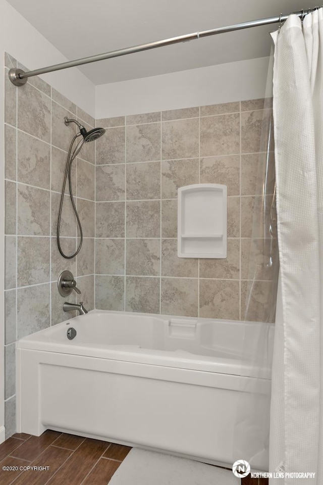19426 Pribilof Loop, Eagle River, AK 99577 - bathroom featuring shower / bath combo and wood finished floors