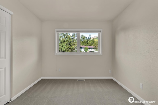 19426 Pribilof Loop, Eagle River, AK 99577 - carpeted empty room featuring baseboards