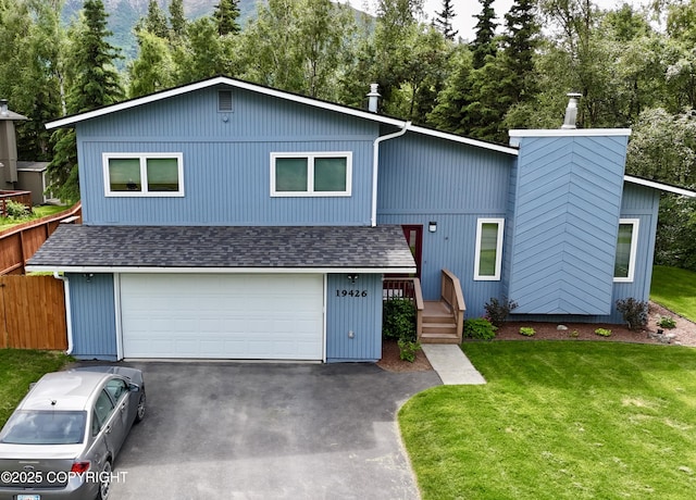 19426 Pribilof Loop, Eagle River, AK 99577 - view of front of property featuring driveway and a garage