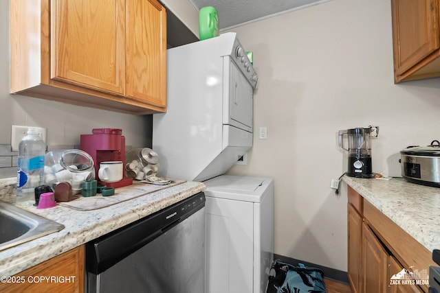 4207 Cope St, Anchorage, AK 99503 - washroom with stacked washer / dryer