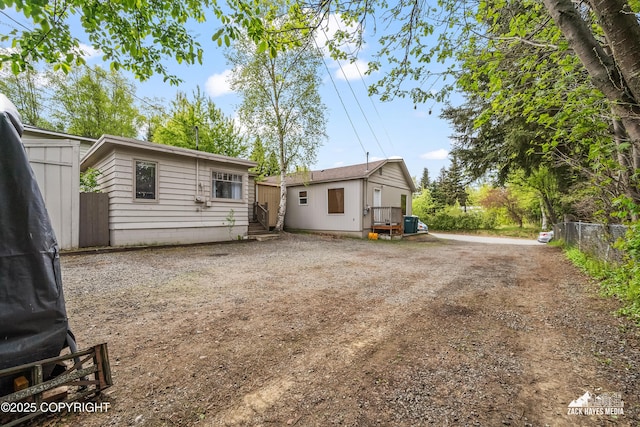 4207 Cope St, Anchorage, AK 99503 - back of property featuring entry steps and driveway