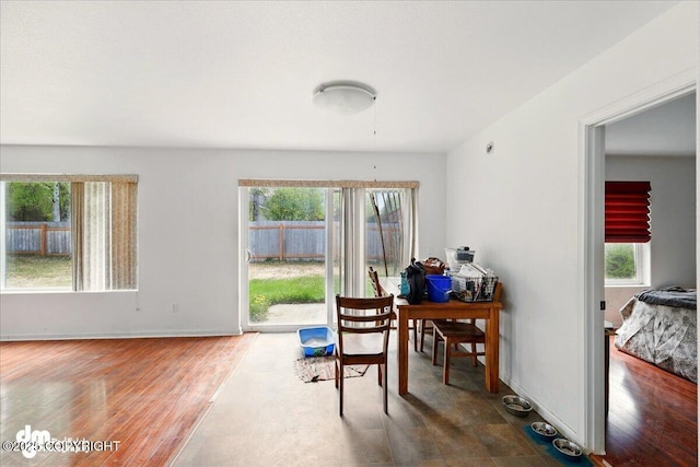 273 S Legacy Loop, Soldotna, AK 99669 - dining space with plenty of natural light, wood finished floors, baseboards, and an office area