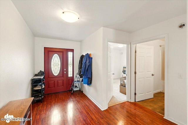 273 S Legacy Loop, Soldotna, AK 99669 - entrance foyer featuring dark wood-style flooring and baseboards
