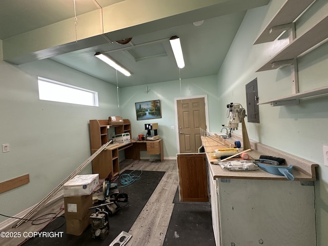 5612 Grand Teton Loop, Anchorage, AK 99502 - miscellaneous room featuring electric panel and light wood-style floors