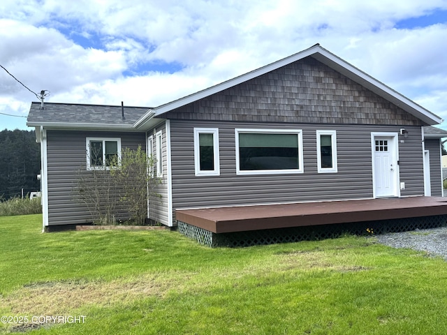 2321 Selief Ln, Kodiak, AK 99615 - back of property with a wooden deck and a yard