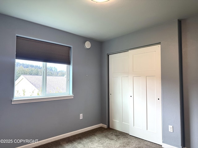 2321 Selief Ln, Kodiak, AK 99615 - unfurnished bedroom with carpet, a closet, and baseboards