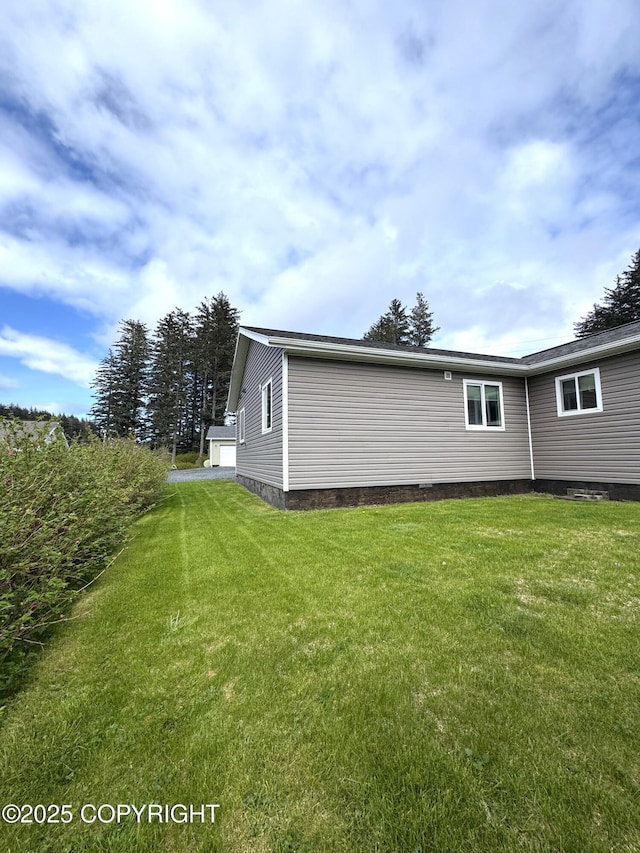 2321 Selief Ln, Kodiak, AK 99615 - view of home's exterior with a lawn