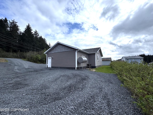 2321 Selief Ln, Kodiak, AK 99615 - view of side of property with gravel driveway