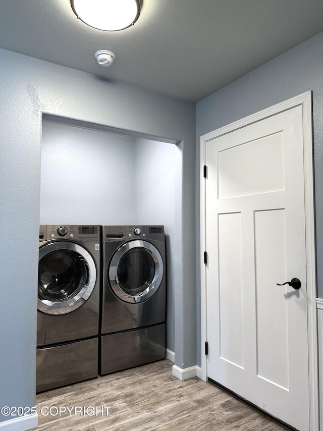 2321 Selief Ln, Kodiak, AK 99615 - washroom with washing machine and dryer, wood finished floors, and baseboards