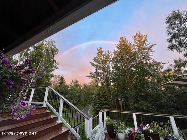 view of balcony at dusk