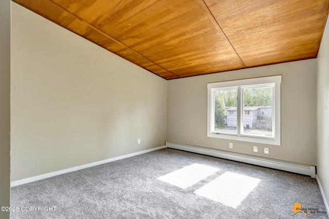 carpeted spare room with wood ceiling, a baseboard heating unit, and baseboards