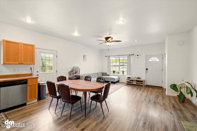 6744 Bogle Bluff Dr, Wasilla, AK 99623 - dining area with light wood-type flooring, a ceiling fan, recessed lighting, and baseboards