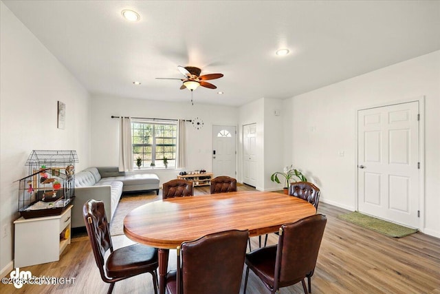 6744 Bogle Bluff Dr, Wasilla, AK 99623 - dining space featuring light wood finished floors, ceiling fan, recessed lighting, and baseboards
