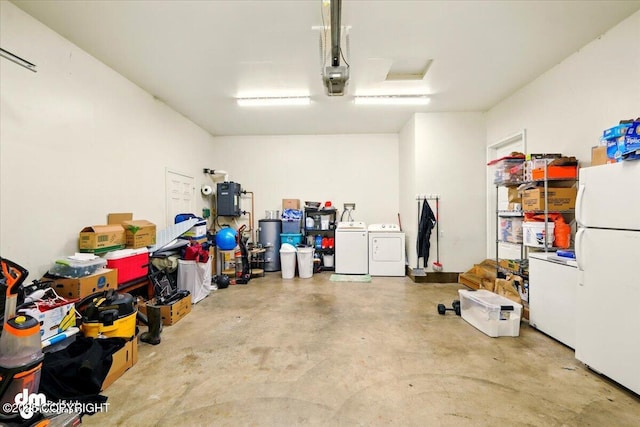 6744 Bogle Bluff Dr, Wasilla, AK 99623 - garage with freestanding refrigerator and separate washer and dryer