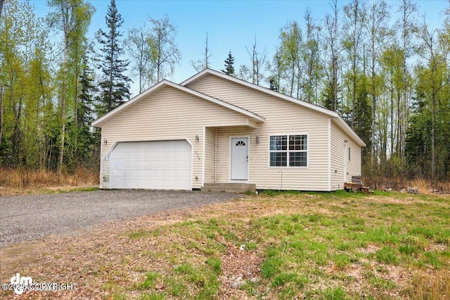 6744 Bogle Bluff Dr, Wasilla, AK 99623 - ranch-style house with a garage and driveway
