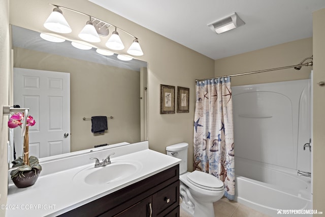 full bathroom with tile patterned floors, toilet, vanity, and shower / tub combo with curtain