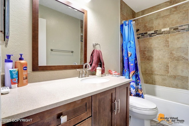 2816 Leighton St, Anchorage, AK 99517 - bathroom featuring vanity, a textured wall, and shower / bath combo