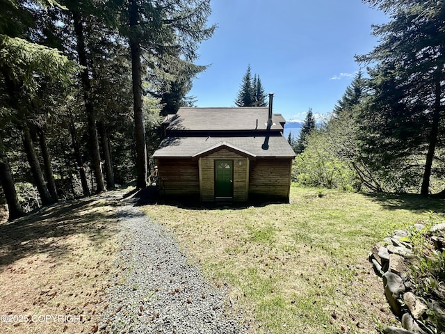 1581 Jade Dr, Homer, AK 99603 - view of side of home featuring a yard and an outbuilding