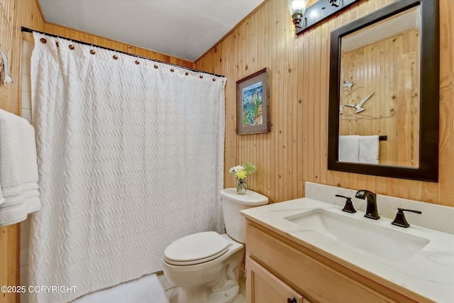 26266 Vallihi Cir, Eagle River, AK 99577 - bathroom with wood walls, toilet, vanity, and curtained shower