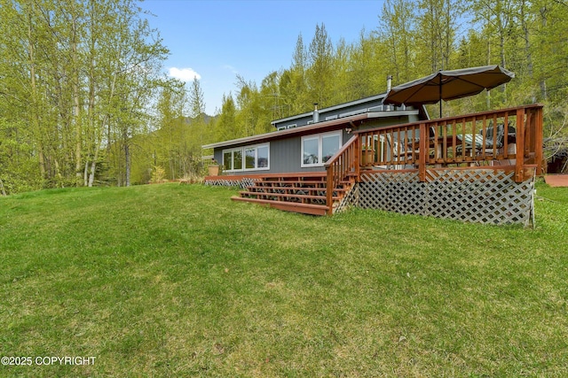 26266 Vallihi Cir, Eagle River, AK 99577 - rear view of property featuring a yard and a wooden deck