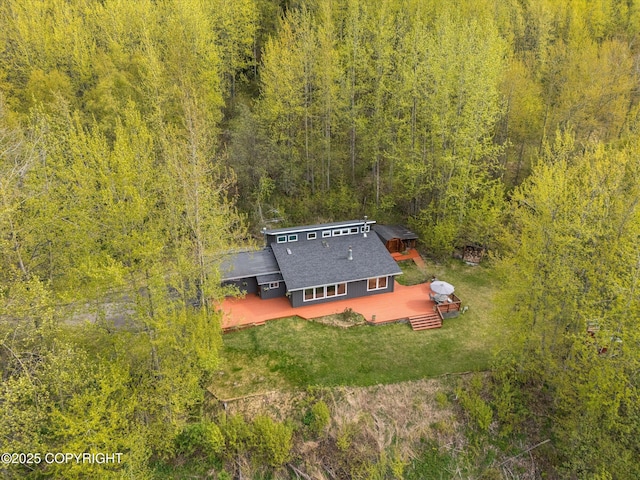 26266 Vallihi Cir, Eagle River, AK 99577 - view of subject property with a forest