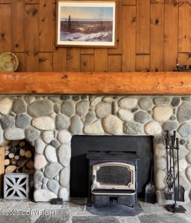 26266 Vallihi Cir, Eagle River, AK 99577 - detailed view of a wood stove and wooden walls