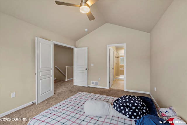 1473 Shallow Pool Dr # J1, Anchorage, AK 99504 - bedroom featuring light carpet, vaulted ceiling, baseboards, connected bathroom, and ceiling fan
