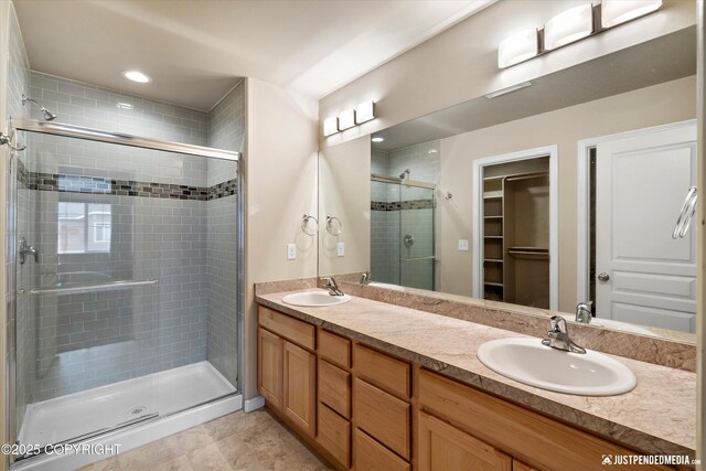 1473 Shallow Pool Dr # J1, Anchorage, AK 99504 - full bath with a stall shower, double vanity, and a spacious closet