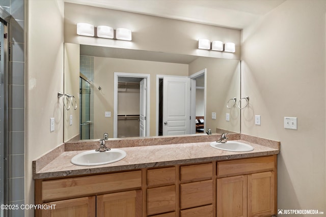 1473 Shallow Pool Dr # J1, Anchorage, AK 99504 - bathroom featuring a shower stall, double vanity, and a spacious closet