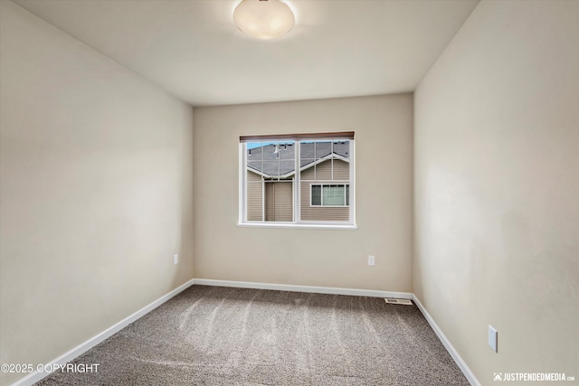 1473 Shallow Pool Dr # J1, Anchorage, AK 99504 - spare room featuring carpet flooring and baseboards