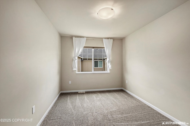 1473 Shallow Pool Dr # J1, Anchorage, AK 99504 - spare room with carpet floors and baseboards