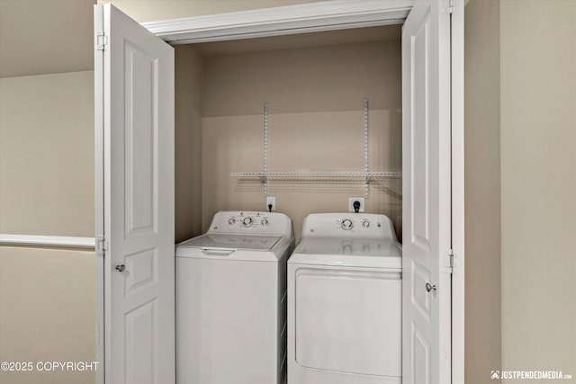 1473 Shallow Pool Dr # J1, Anchorage, AK 99504 - laundry room with washing machine and clothes dryer