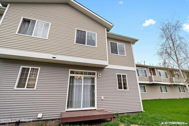 1473 Shallow Pool Dr # J1, Anchorage, AK 99504 - back of house with a lawn
