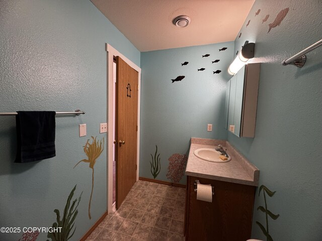 33325 Vinewood Ln, Seward, AK 99664 - bathroom with vanity and baseboards