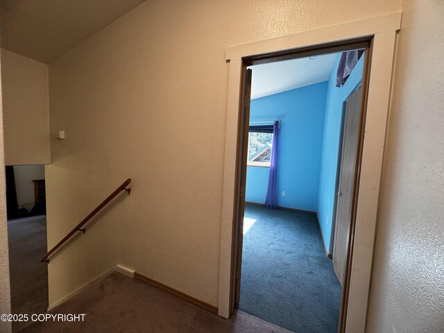 33325 Vinewood Ln, Seward, AK 99664 - staircase with carpet floors, vaulted ceiling, and baseboards
