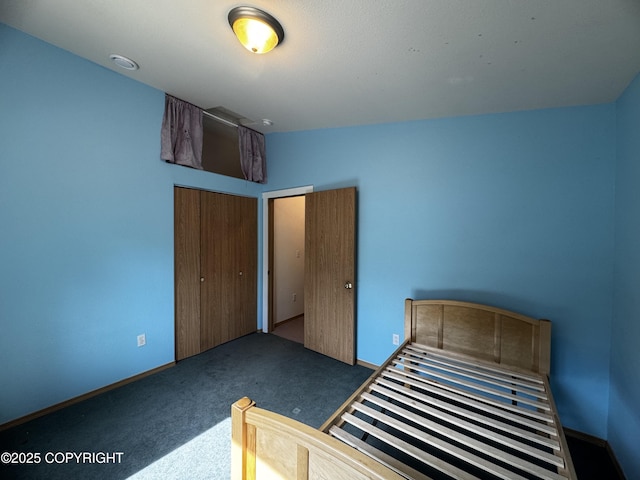 33325 Vinewood Ln, Seward, AK 99664 - unfurnished bedroom with carpet flooring and a closet