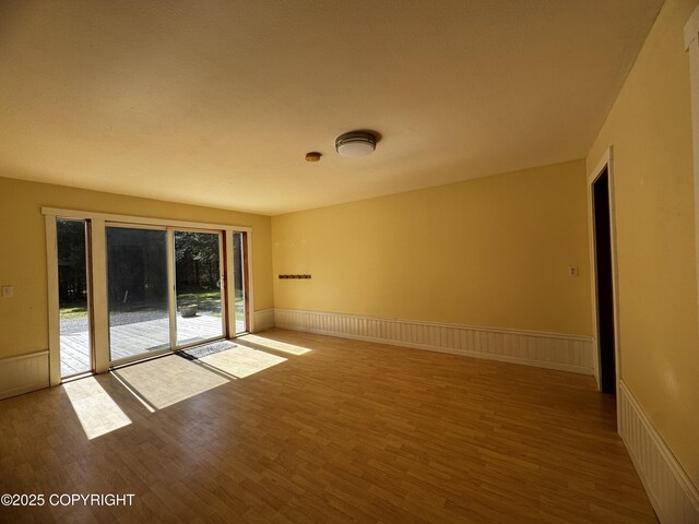 33325 Vinewood Ln, Seward, AK 99664 - unfurnished room with wood finished floors
