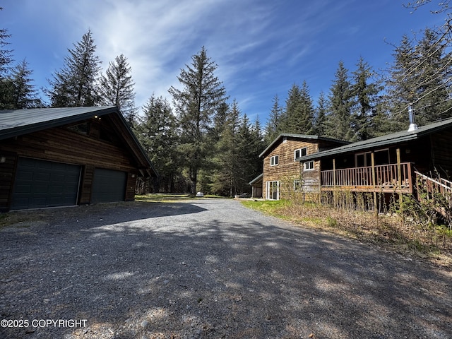 33325 Vinewood Ln, Seward, AK 99664 - view of side of property with a detached garage and an outdoor structure