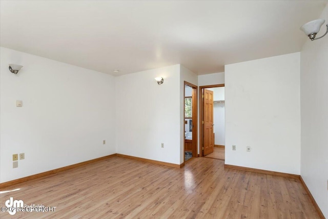 14184 W Jojoba Rd, Big Lake, AK 99623 - spare room with light wood finished floors and baseboards