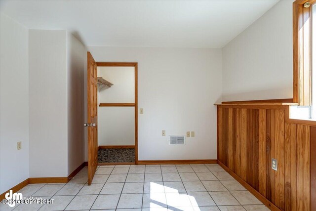14184 W Jojoba Rd, Big Lake, AK 99623 - spare room with light tile patterned floors and baseboards