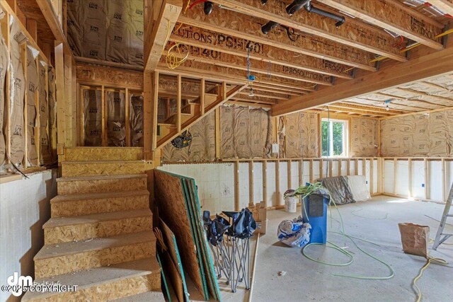 14184 W Jojoba Rd, Big Lake, AK 99623 - below grade area featuring stairway