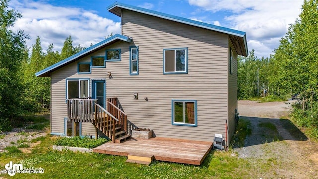 14184 W Jojoba Rd, Big Lake, AK 99623 - back of property with a deck