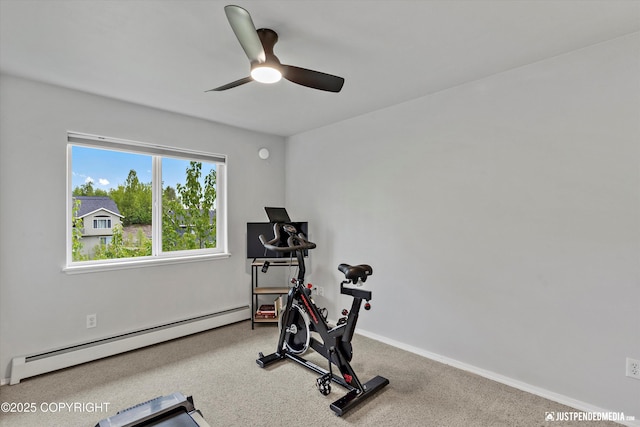 workout area with a baseboard radiator, ceiling fan, carpet flooring, and baseboards