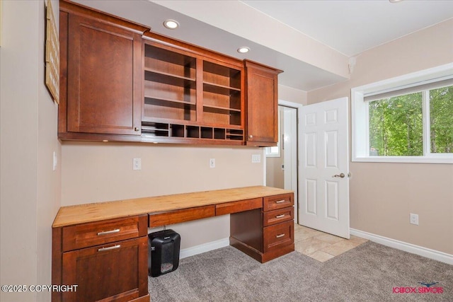 2750 E Whispering Woods Dr, Wasilla, AK 99654 - unfurnished office with light carpet, built in study area, baseboards, and recessed lighting